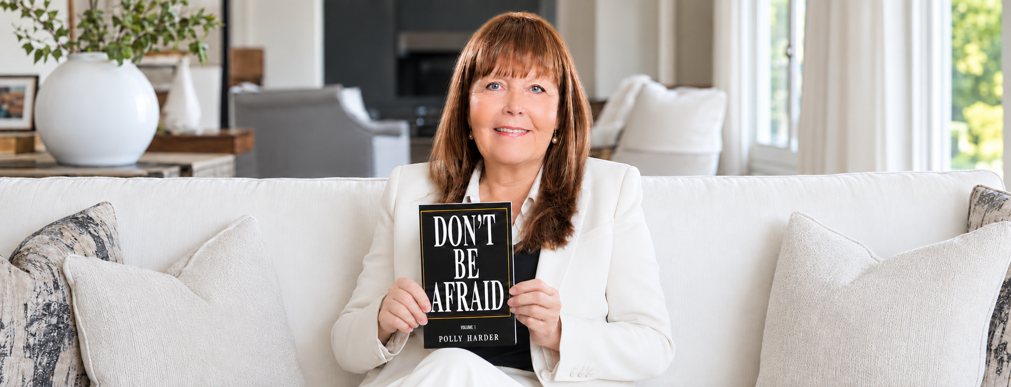 Polly Harder holding Don't Be Afraid